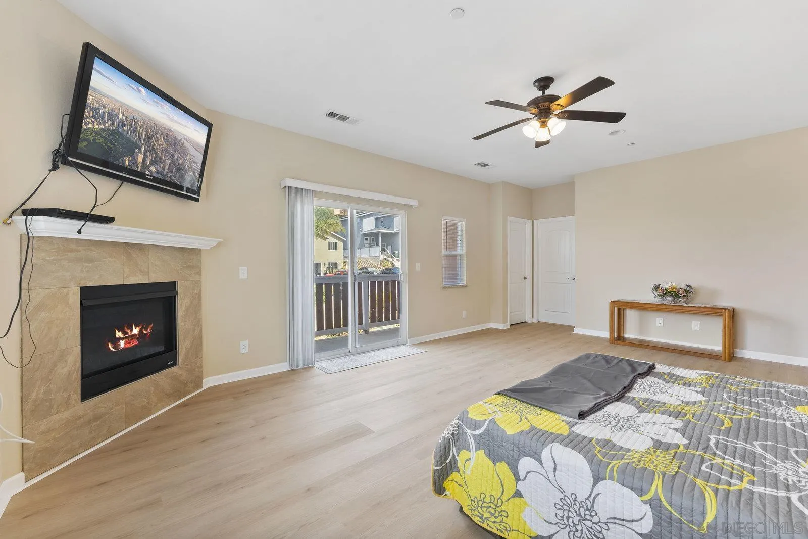 1637 Paraiso Avenue Spring Valley, CA 91977 - Photo 6 of 45 a bedroom with a bed and a fireplace