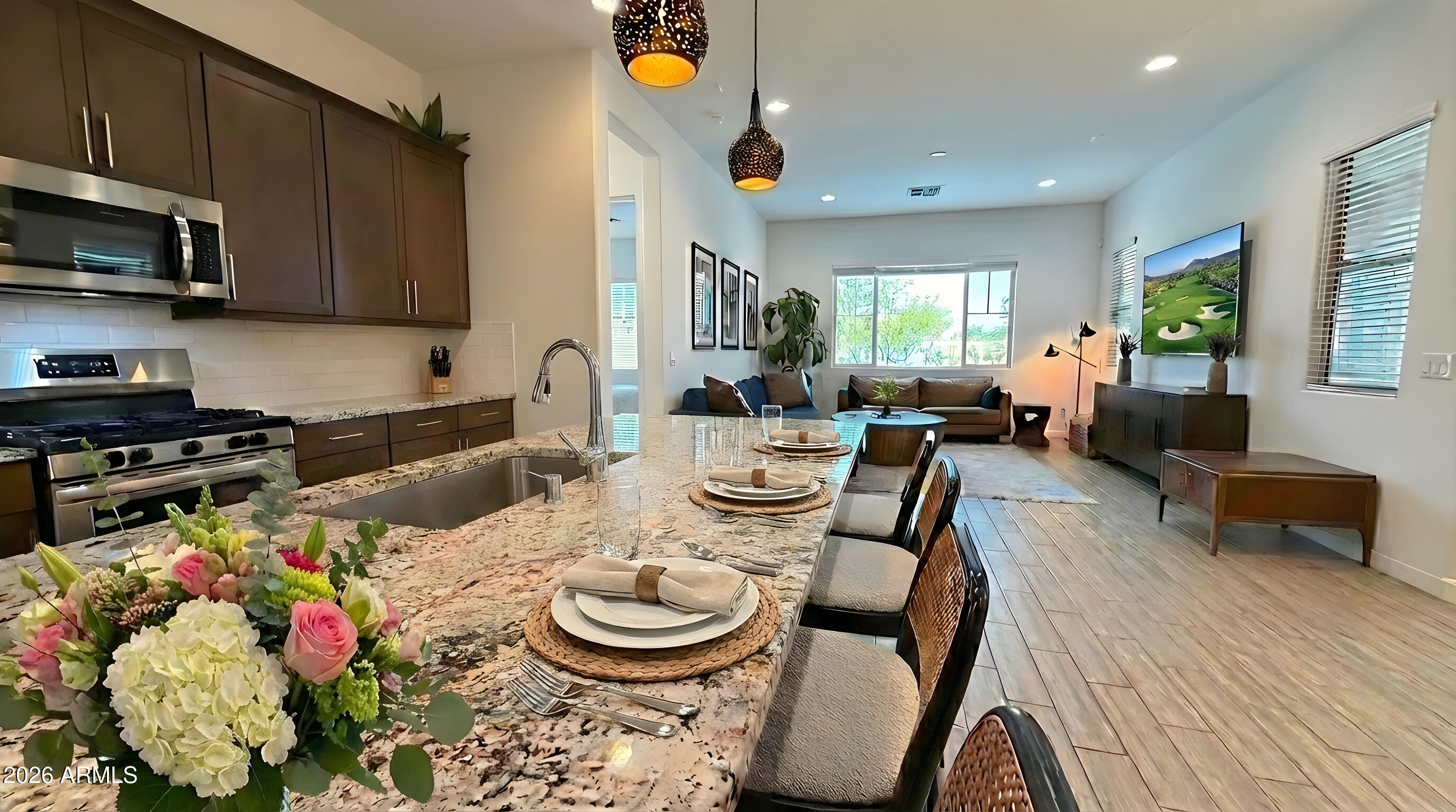 19615 West Cheery Lynn Road Buckeye, AZ 85396 - Photo 19 of 32 Kitchen into Great room