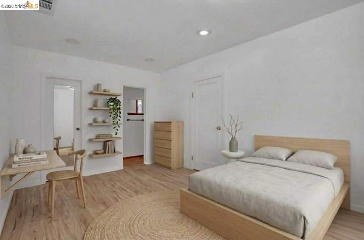 1922 Taylor Road Bethel Island, CA 94511 - Photo 18 of 49 Bedroom featuring light wood-style flooring and baseboards