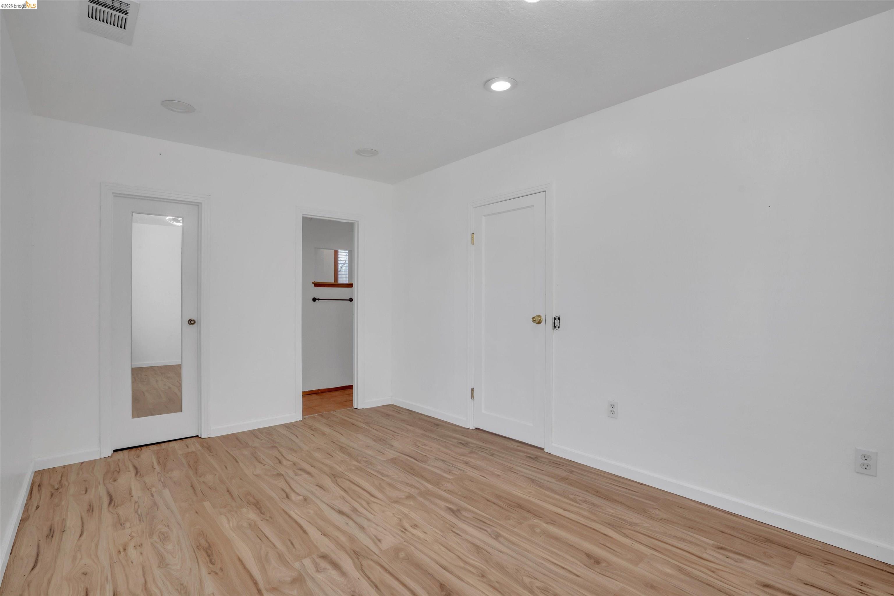 1922 Taylor Road Bethel Island, CA 94511 - Photo 19 of 49 Unfurnished bedroom featuring light wood finished floors and baseboards