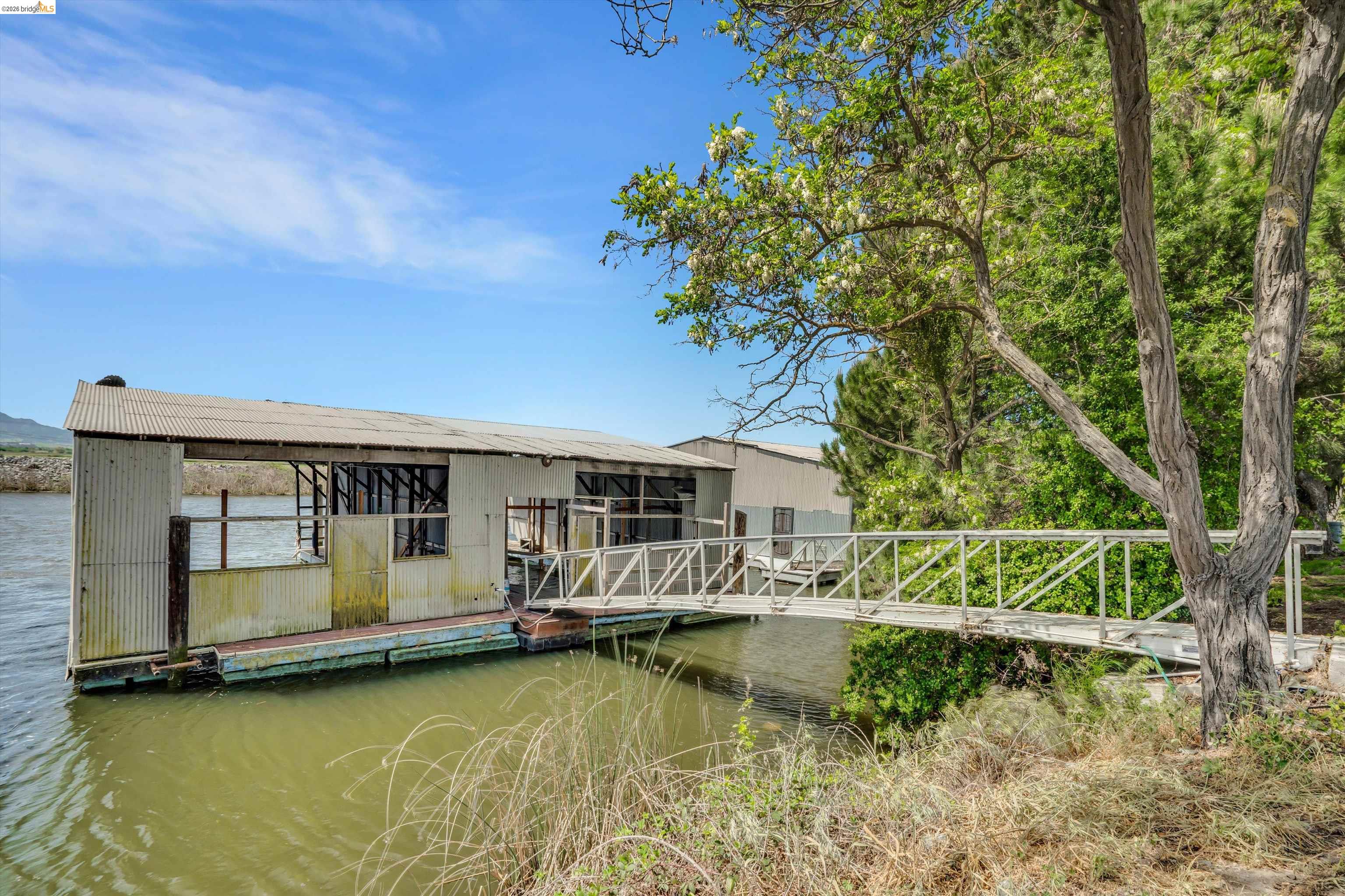 1922 Taylor Road Bethel Island, CA 94511 - Photo 37 of 49 Back of house featuring a water view