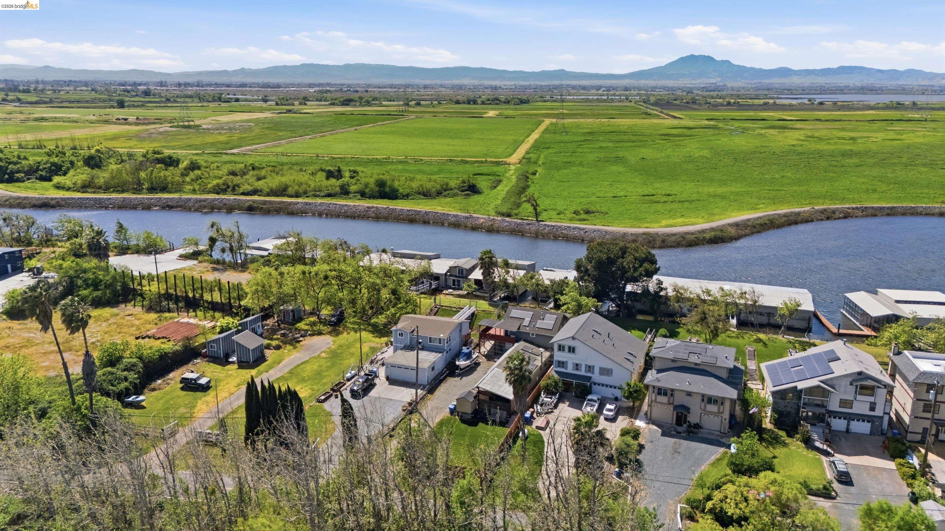1922 Taylor Road Bethel Island, CA 94511 - Photo 40 of 49 Overview of rural landscape with a water and mountain view and nearby suburban area