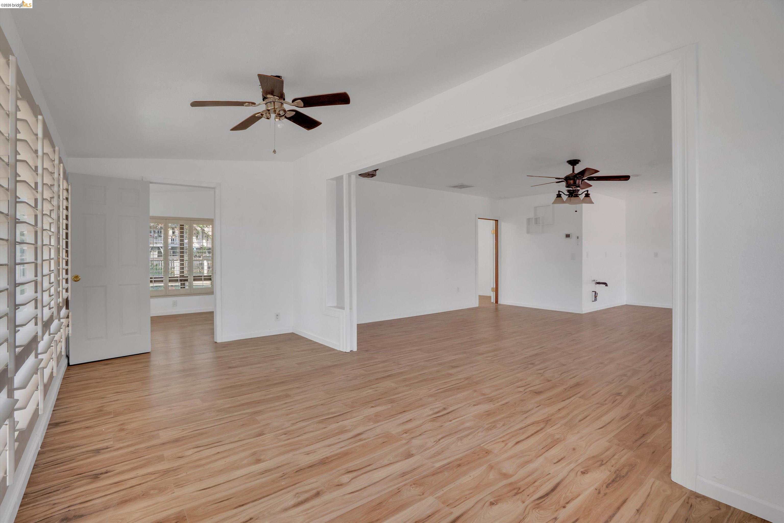 1922 Taylor Road Bethel Island, CA 94511 - Photo 4 of 49 Empty room with ceiling fan and light wood-style floors