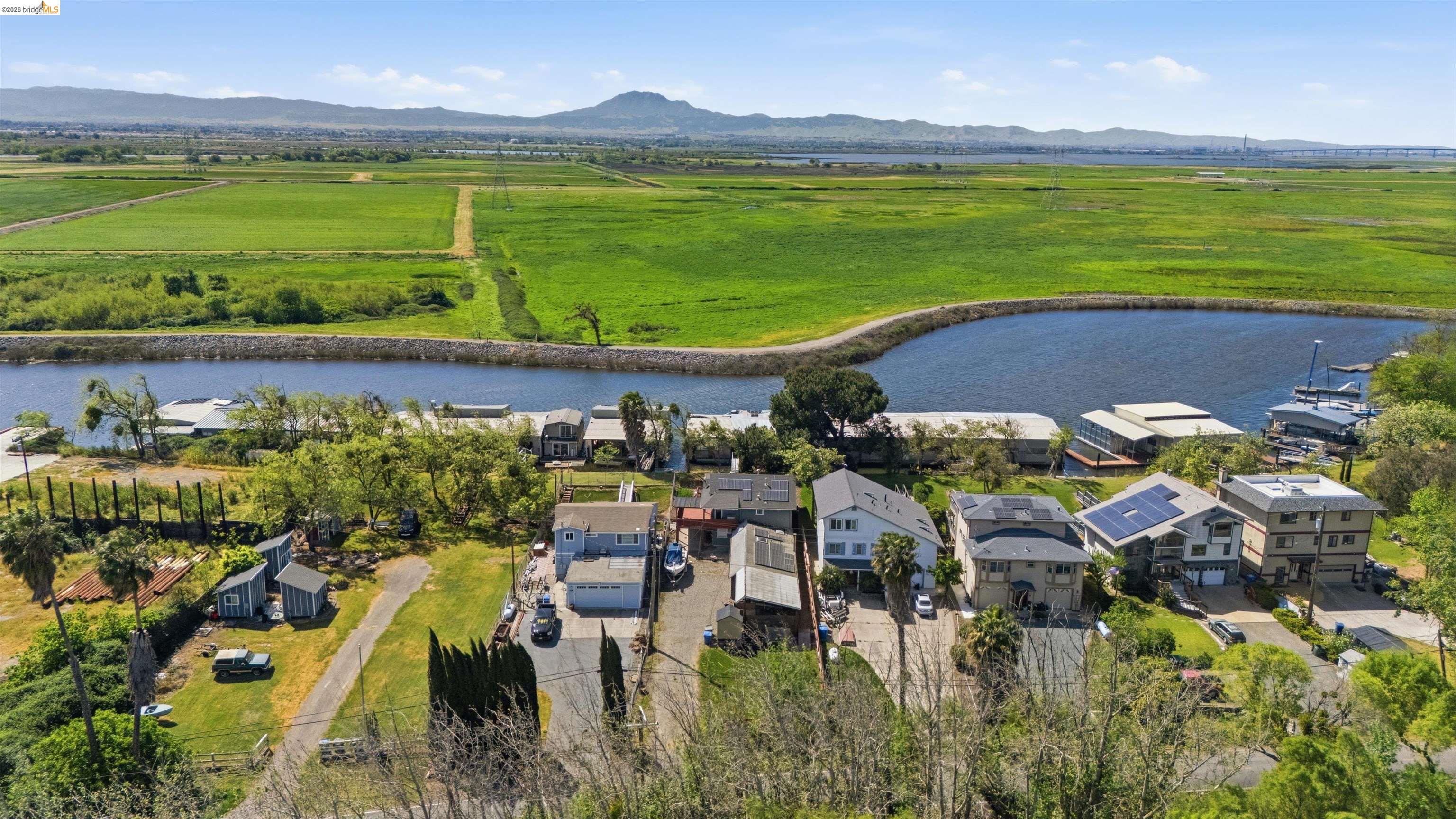 1922 Taylor Road Bethel Island, CA 94511 - Photo 41 of 49 Overview of rural landscape with a water and mountain view and nearby suburban area