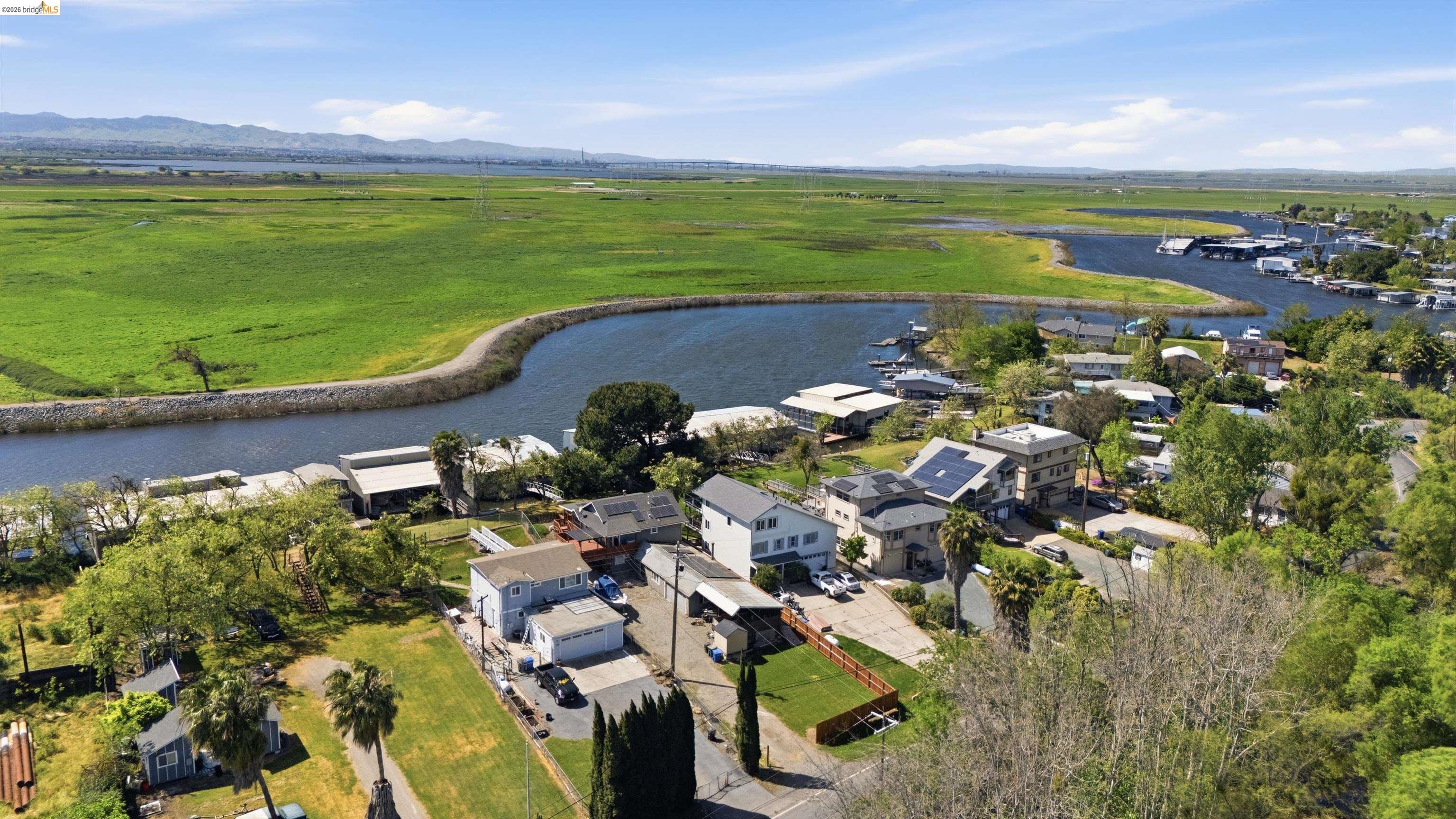 1922 Taylor Road Bethel Island, CA 94511 - Photo 42 of 49 Aerial perspective of suburban area featuring a water and mountain view