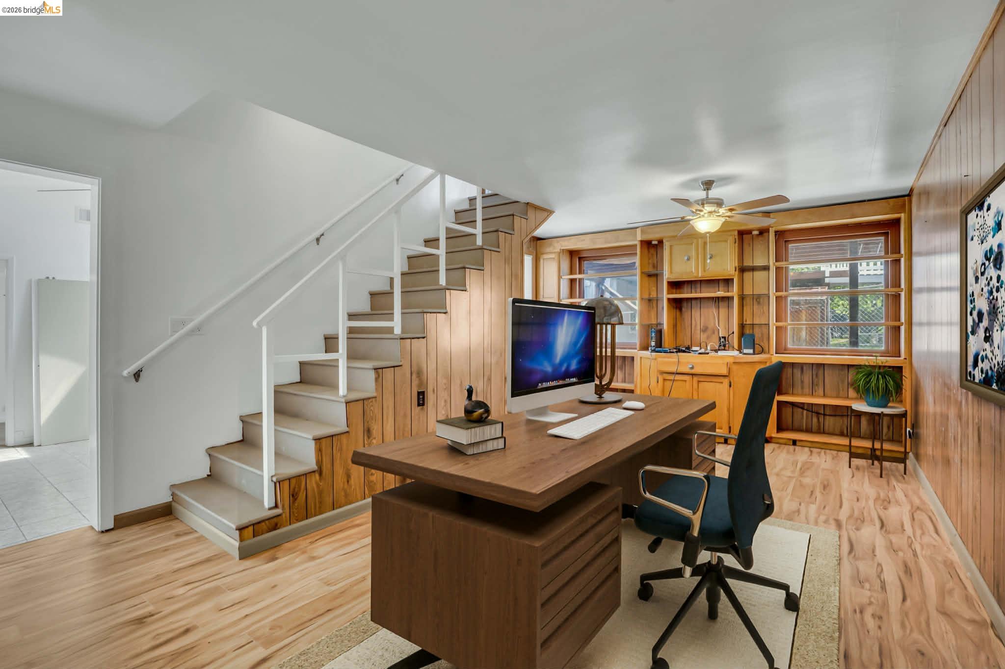 1922 Taylor Road Bethel Island, CA 94511 - Photo 9 of 49 Home office featuring light wood finished floors, wooden walls, and ceiling fan