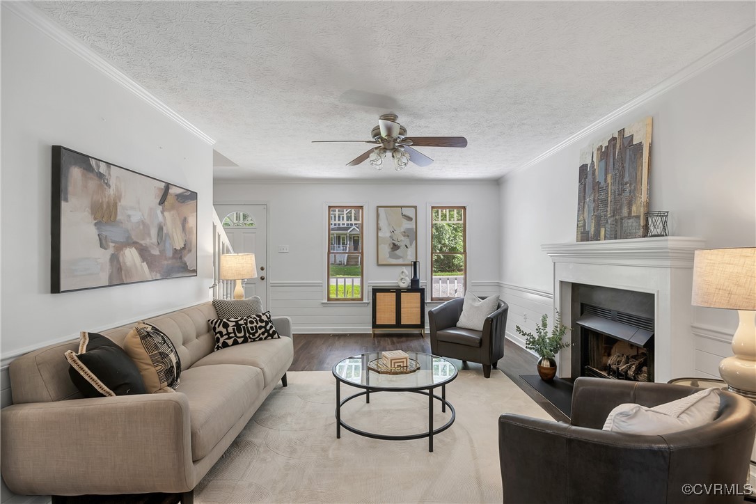 10718 Timberun Road Chesterfield, VA 23832 - Photo 6 of 45 a living room with furniture and a fireplace