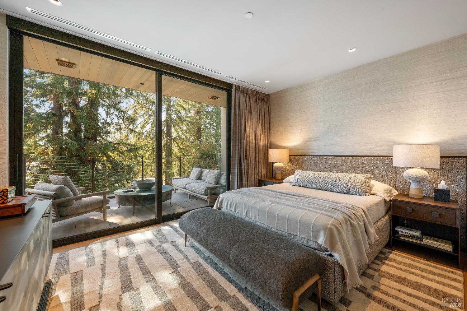 171 Sawmill Circle, Unit 304 Healdsburg, CA 95448 - Photo 14 of 28 a bedroom with a bed and large windows