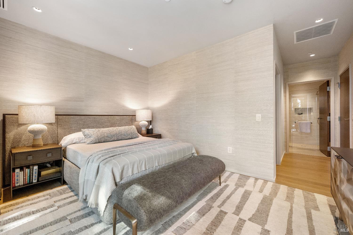 171 Sawmill Circle, Unit 304 Healdsburg, CA 95448 - Photo 17 of 28 a bedroom with a bed and a walk in closet