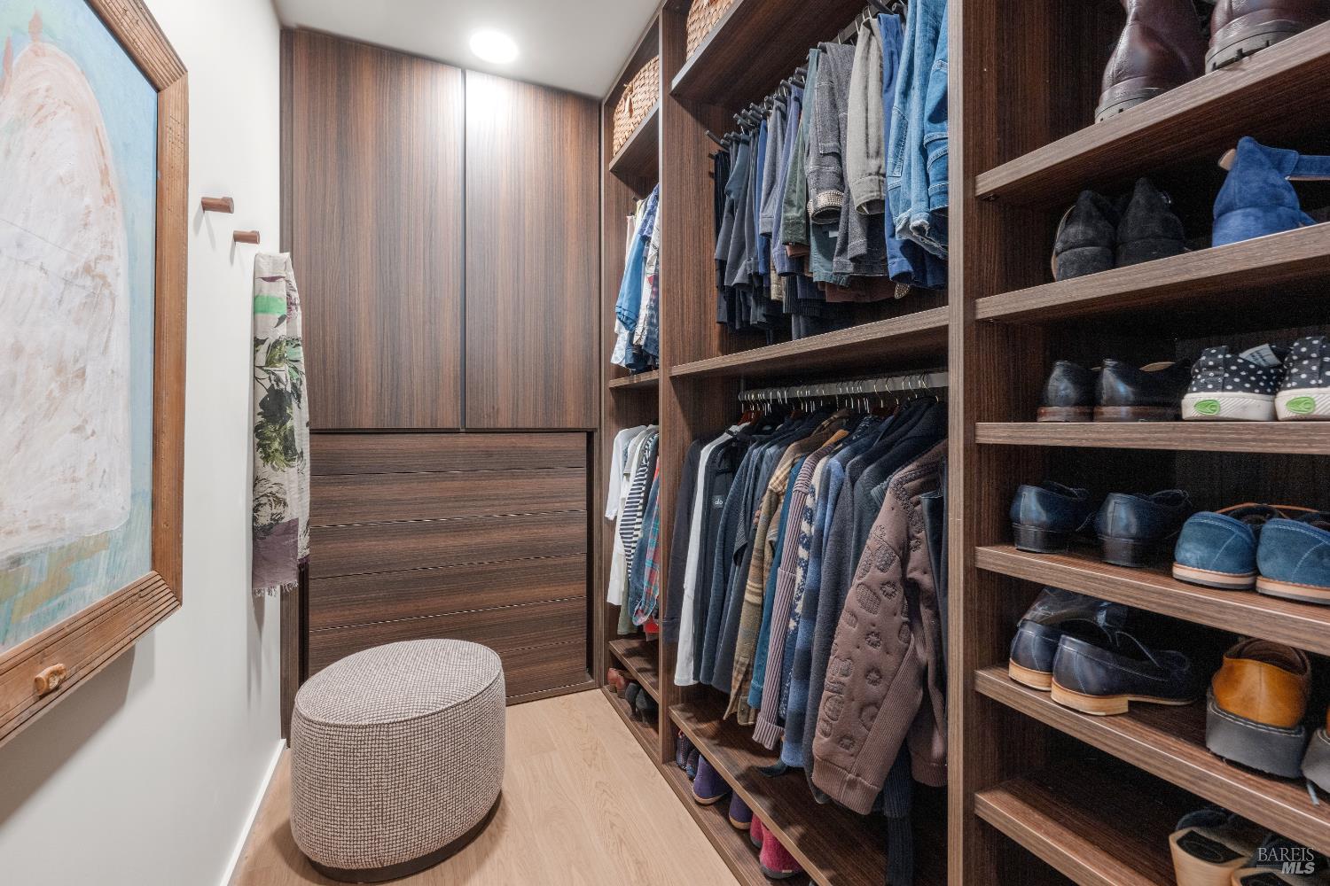 171 Sawmill Circle, Unit 304 Healdsburg, CA 95448 - Photo 18 of 28 a view of walk in closet with clothes and shoes