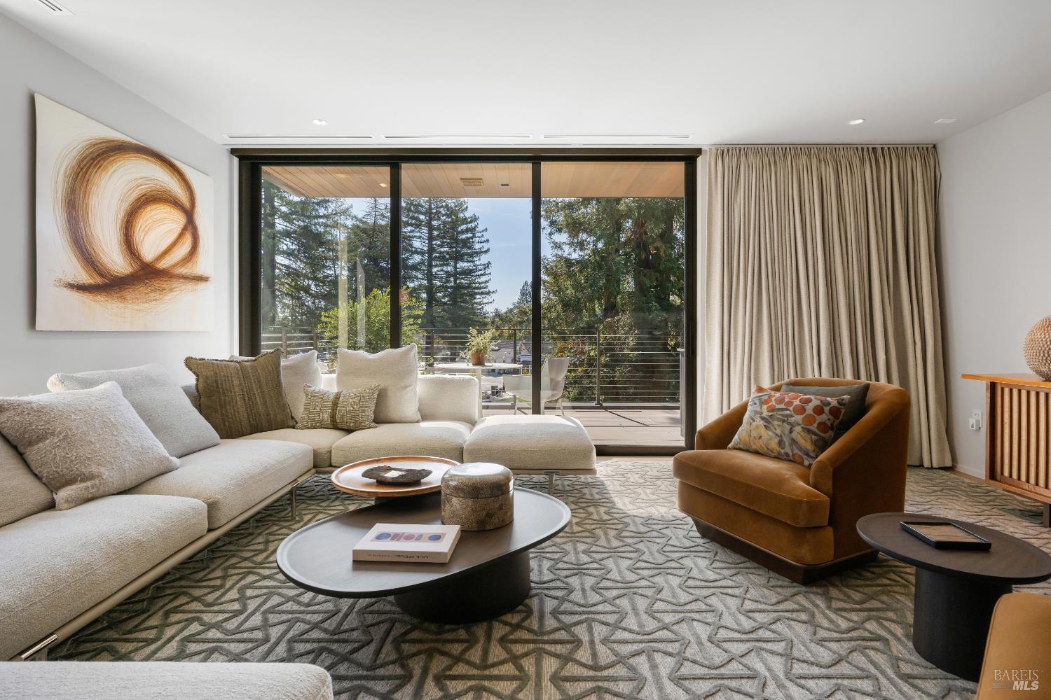 171 Sawmill Circle, Unit 304 Healdsburg, CA 95448 - Photo 6 of 28 a living room with furniture and a large window