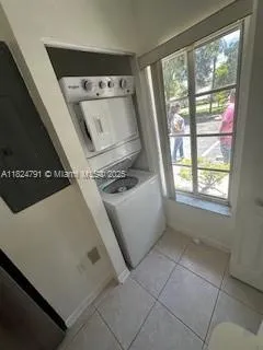 a view of a hallway with a window