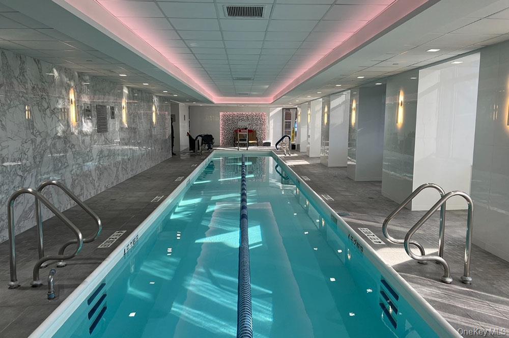 112-01 Queens Boulevard, Unit 23C Queens, NY 11375 - Photo 30 of 32 a view of a swimming pool