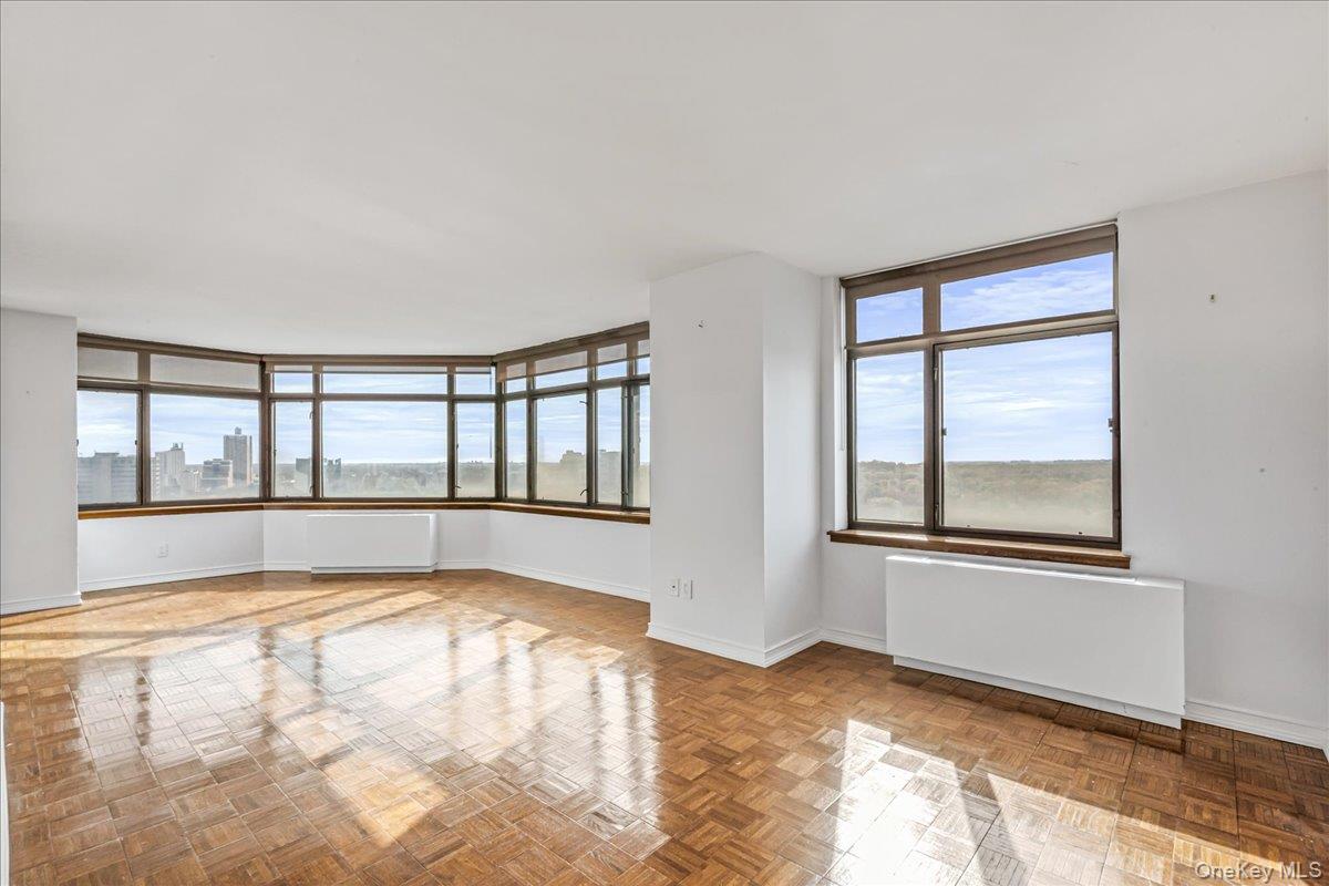 112-01 Queens Boulevard, Unit 23C Queens, NY 11375 - Photo 6 of 32 a view of an empty room with a window