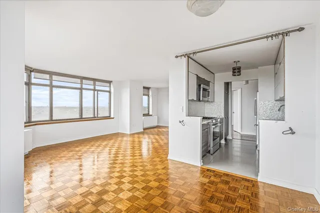 a view of an empty room and window