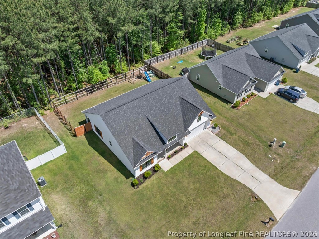 83 Kotata Avenue Bunnlevel, NC 28323 - Photo 13 of 49 an aerial view of a house with a swimming pool