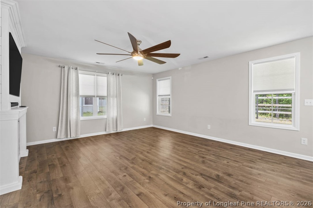 83 Kotata Avenue Bunnlevel, NC 28323 - Photo 19 of 49 wooden floor in an empty room with a window