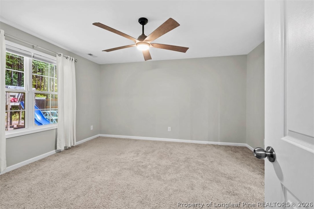 83 Kotata Avenue Bunnlevel, NC 28323 - Photo 34 of 49 wooden floor in an empty room with a window