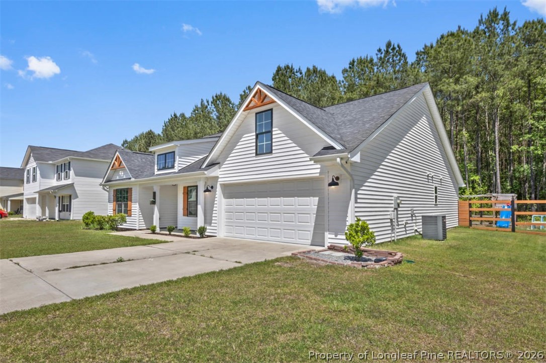 83 Kotata Avenue Bunnlevel, NC 28323 - Photo 4 of 49 a view of a house with a patio