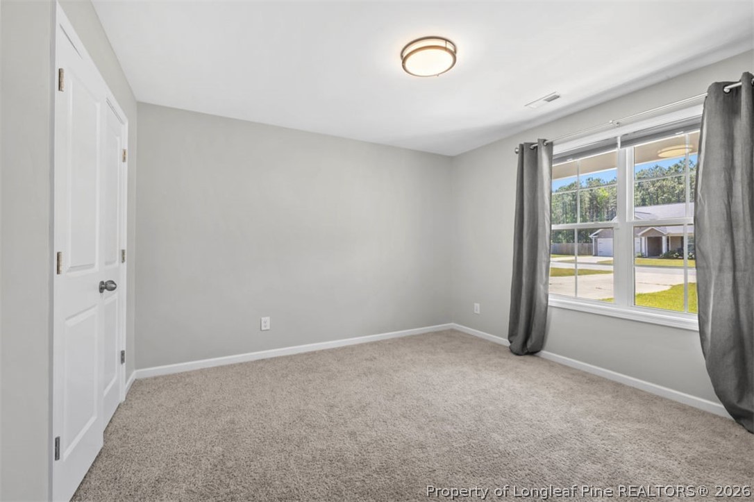 83 Kotata Avenue Bunnlevel, NC 28323 - Photo 44 of 49 a view of an empty room with a window