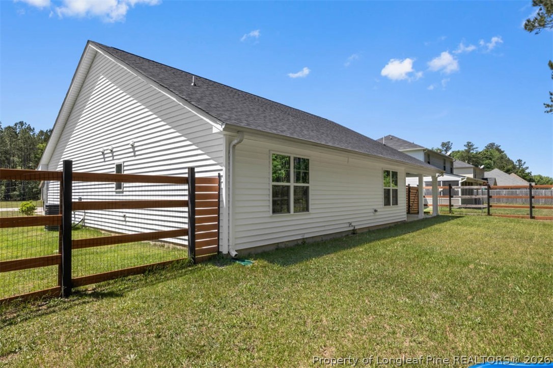 83 Kotata Avenue Bunnlevel, NC 28323 - Photo 49 of 49 a view of a house with backyard