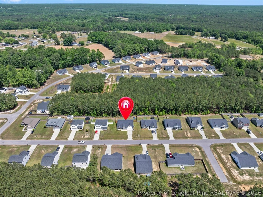 83 Kotata Avenue Bunnlevel, NC 28323 - Photo 8 of 49 an aerial view of residential house with outdoor space and pool