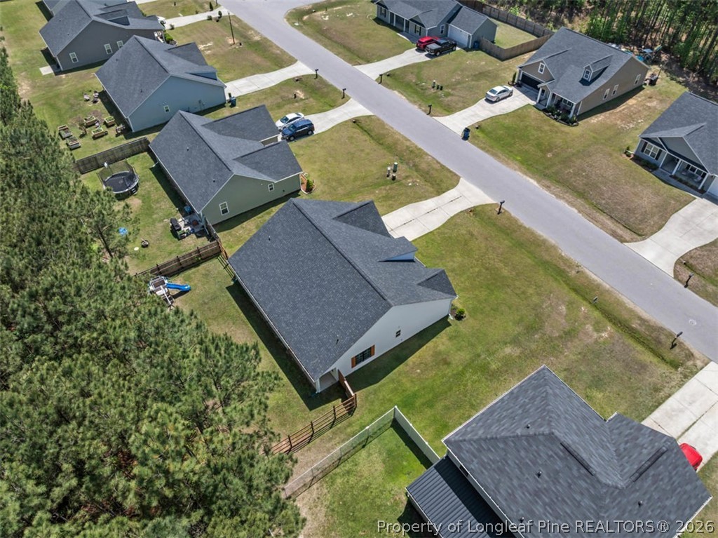 83 Kotata Avenue Bunnlevel, NC 28323 - Photo 10 of 49 an aerial view of a house with a garden