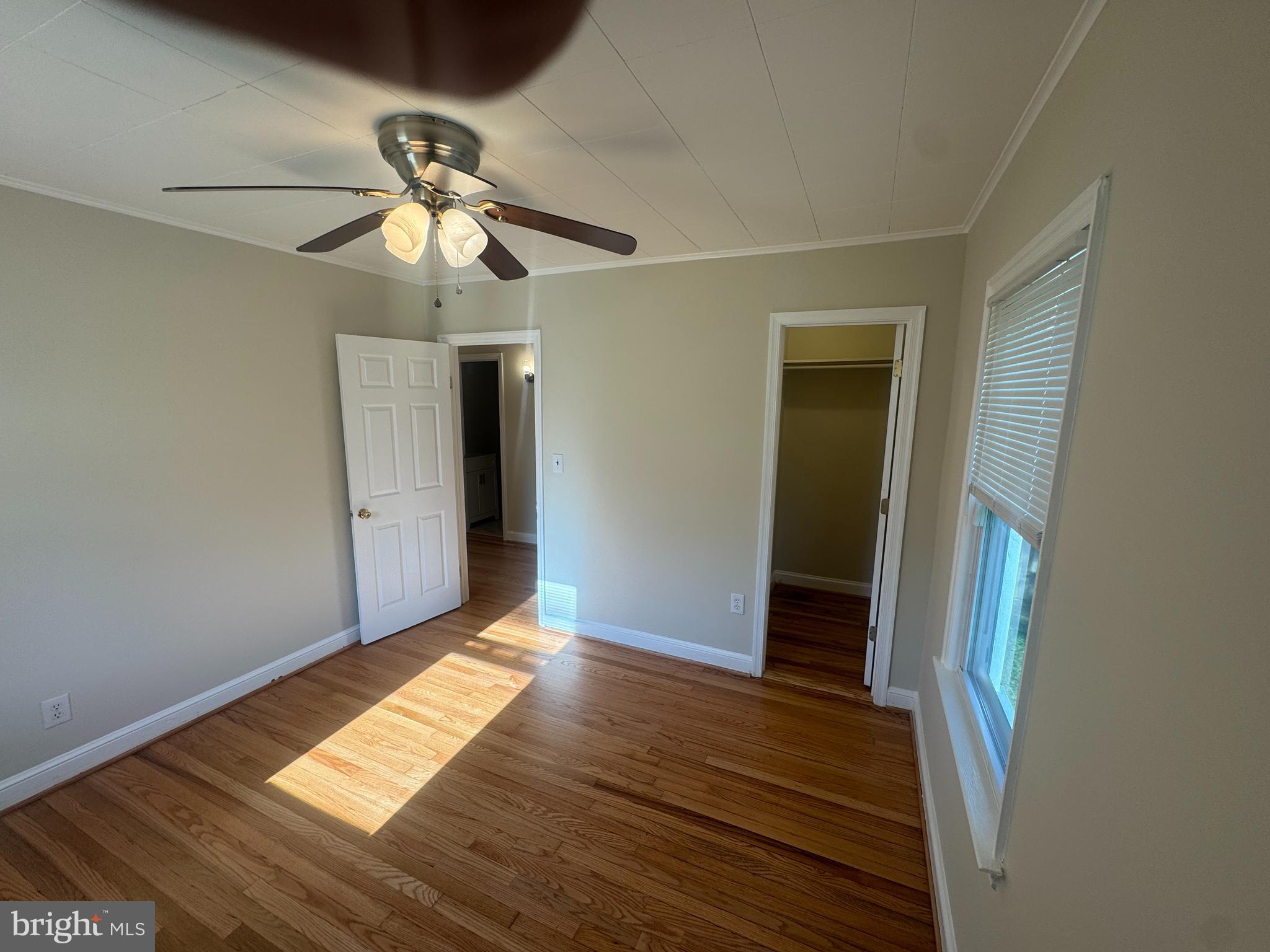 2810 Xavier Lane District Heights, MD 20747 - Photo 23 of 27 a view of empty room with wooden floor