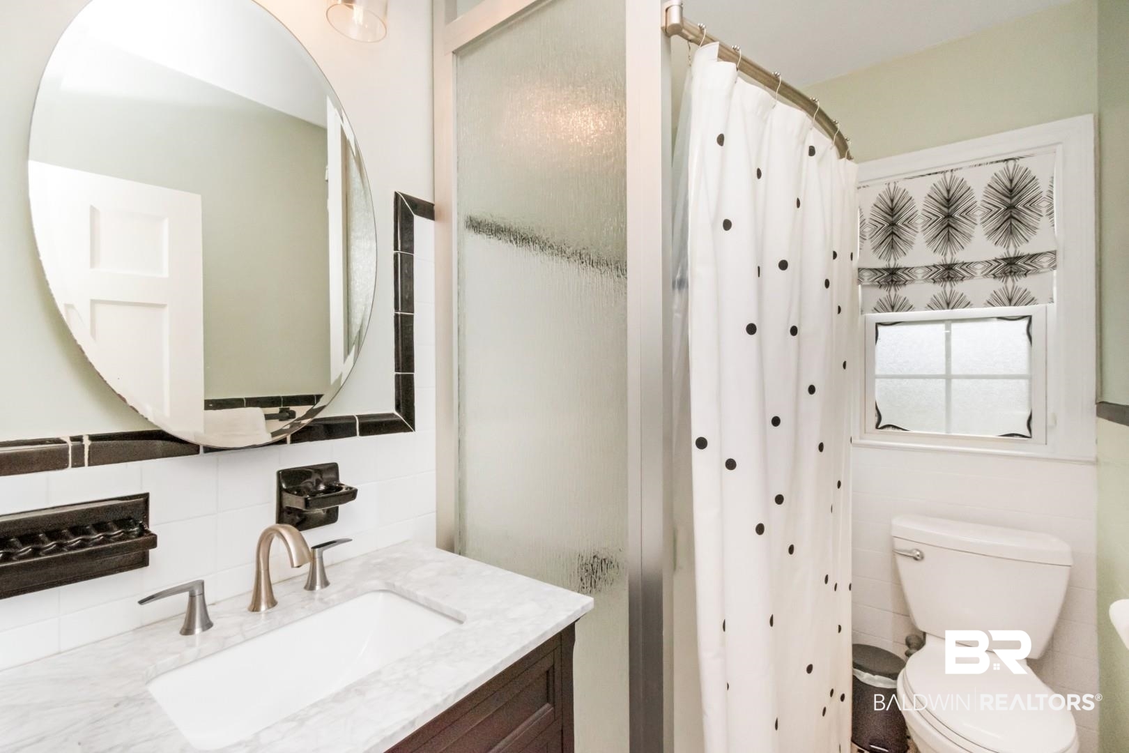214 Upham Street, Unit 3D Mobile, AL 36607 - Photo 16 of 34 Bathroom with curtained shower, decorative backsplash, and vanity