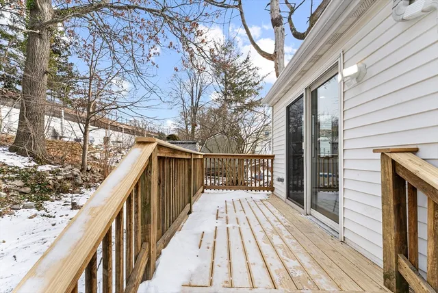 a view of balcony and wooden floor