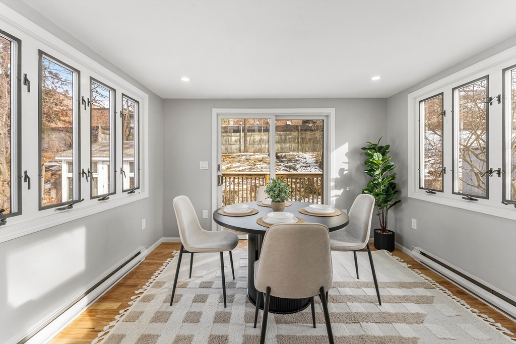 10 Van Brunt Street Boston, MA 02136 - Photo 9 of 31 a view of a dining room with furniture window and outside view