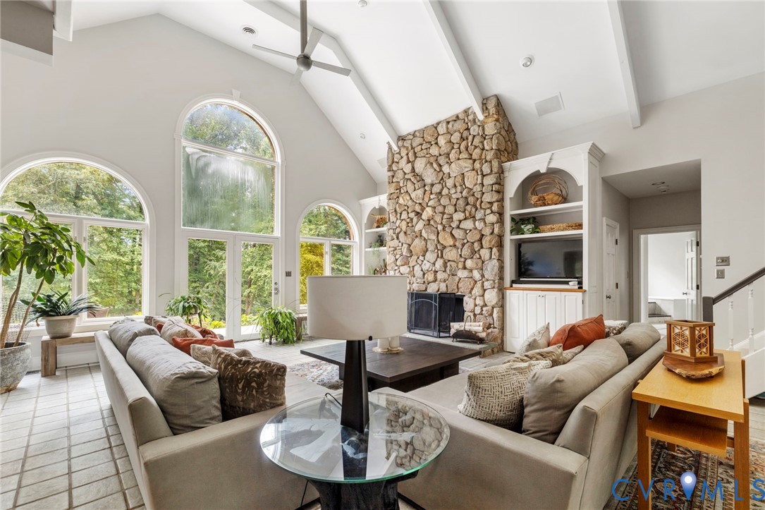 2125 Strawberry Run Crozier, VA 23039 - Photo 13 of 50 a living room with fireplace furniture and a large window