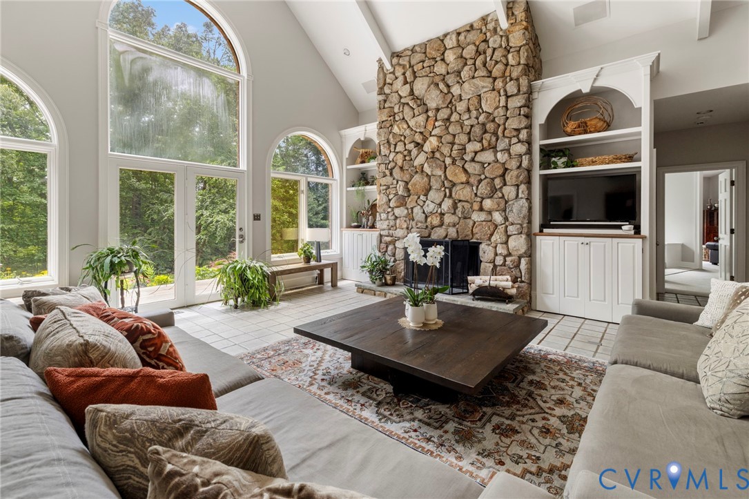 2125 Strawberry Run Crozier, VA 23039 - Photo 15 of 50 a living room with fireplace furniture and a flat screen tv