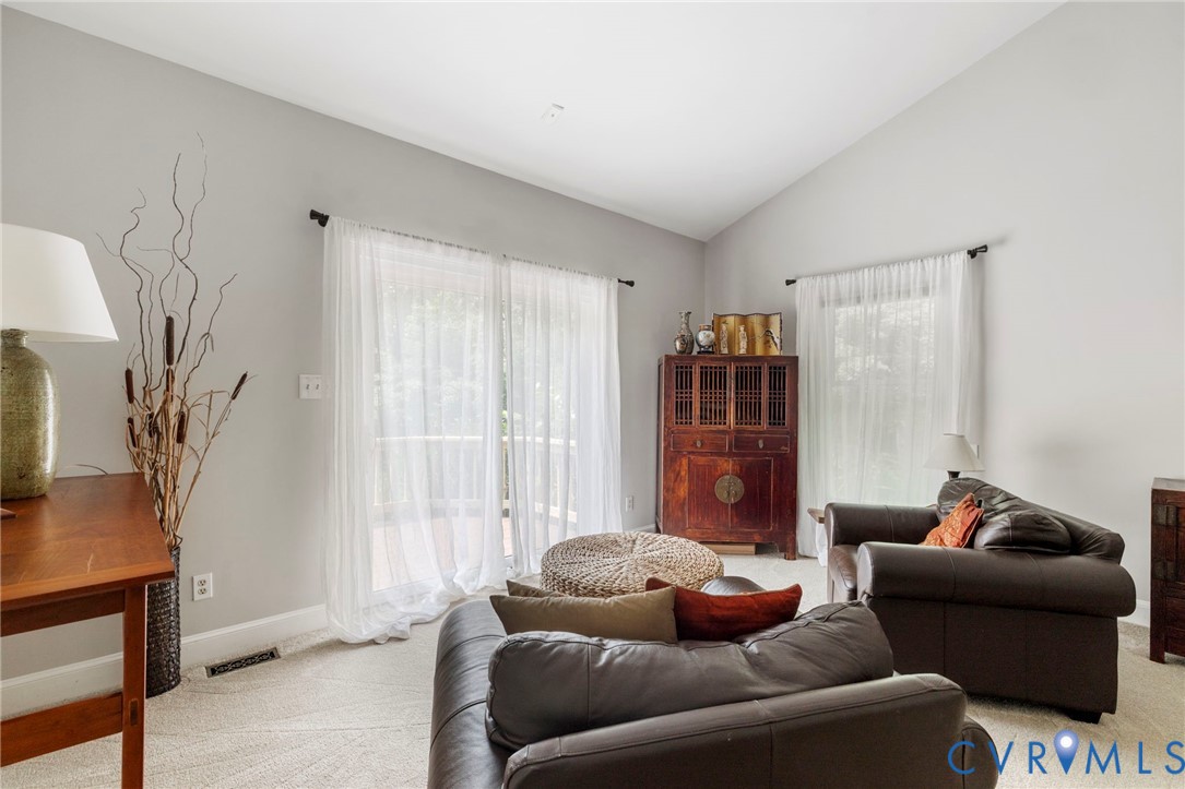 2125 Strawberry Run Crozier, VA 23039 - Photo 18 of 50 a living room with furniture and a window