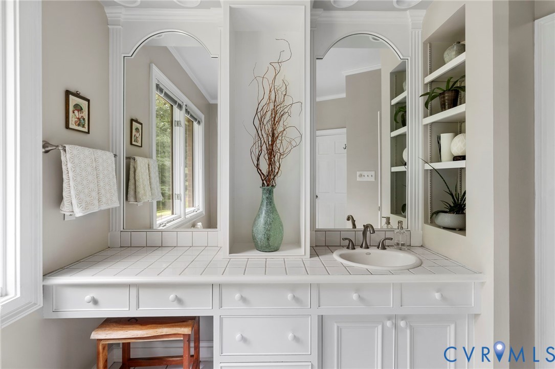2125 Strawberry Run Crozier, VA 23039 - Photo 21 of 50 a bathroom with a sink and a mirror