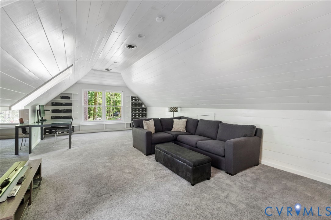 2125 Strawberry Run Crozier, VA 23039 - Photo 35 of 50 a living room with furniture and a wooden floor
