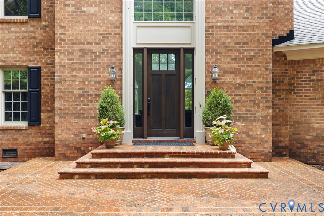 2125 Strawberry Run Crozier, VA 23039 - Photo 10 of 50 a front view of a house with a garden