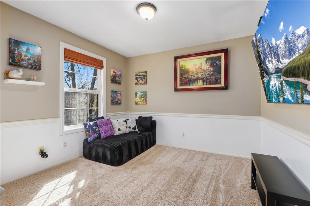 12 Globe Lane Ladera Ranch, CA 92694 - Photo 24 of 37 a bedroom with furniture and window