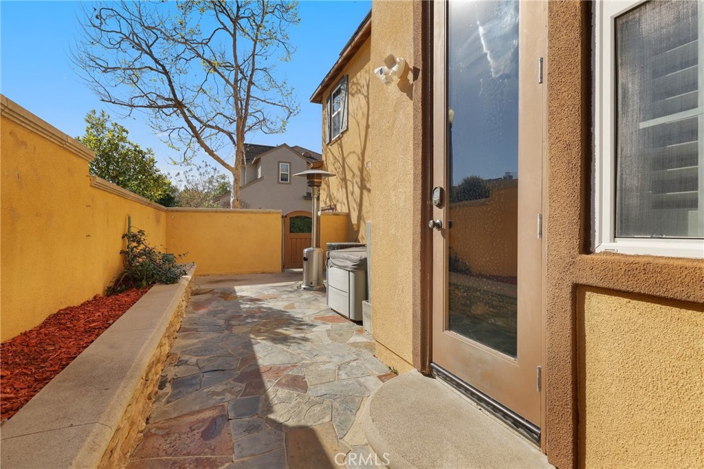 12 Globe Lane Ladera Ranch, CA 92694 - Photo 30 of 37 a view of a pathway of a house
