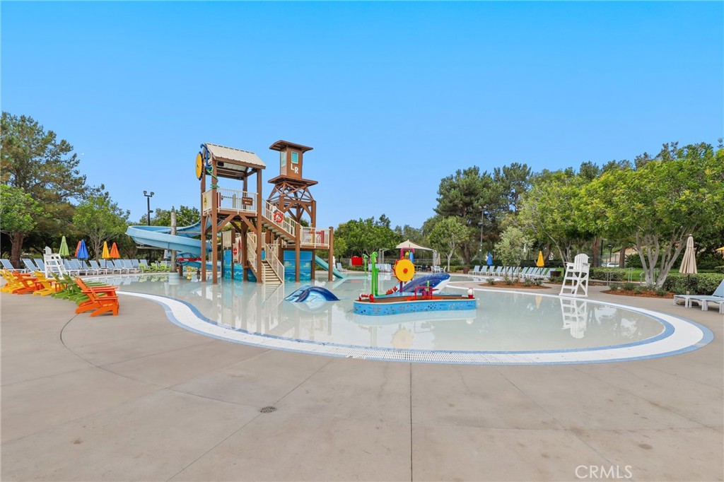 12 Globe Lane Ladera Ranch, CA 92694 - Photo 33 of 37 a view of a park with swings and slides
