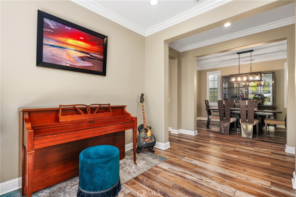 12 Globe Lane Ladera Ranch, CA 92694 - Photo 6 of 37 a room with furniture and wooden floor
