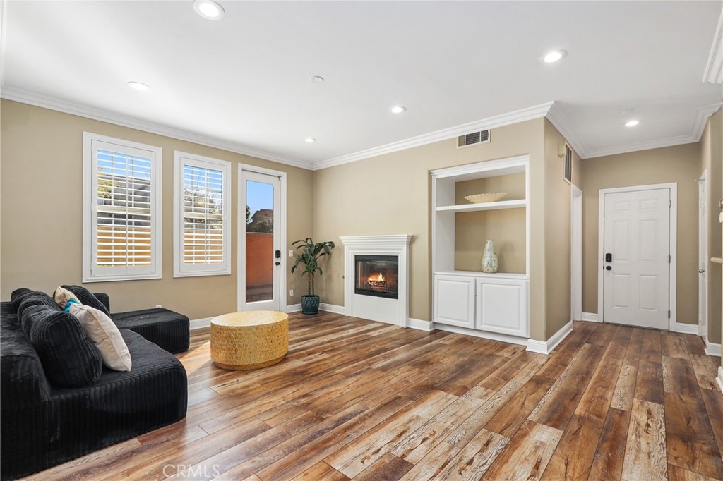 12 Globe Lane Ladera Ranch, CA 92694 - Photo 8 of 37 a spacious bedroom with a bed and a couch