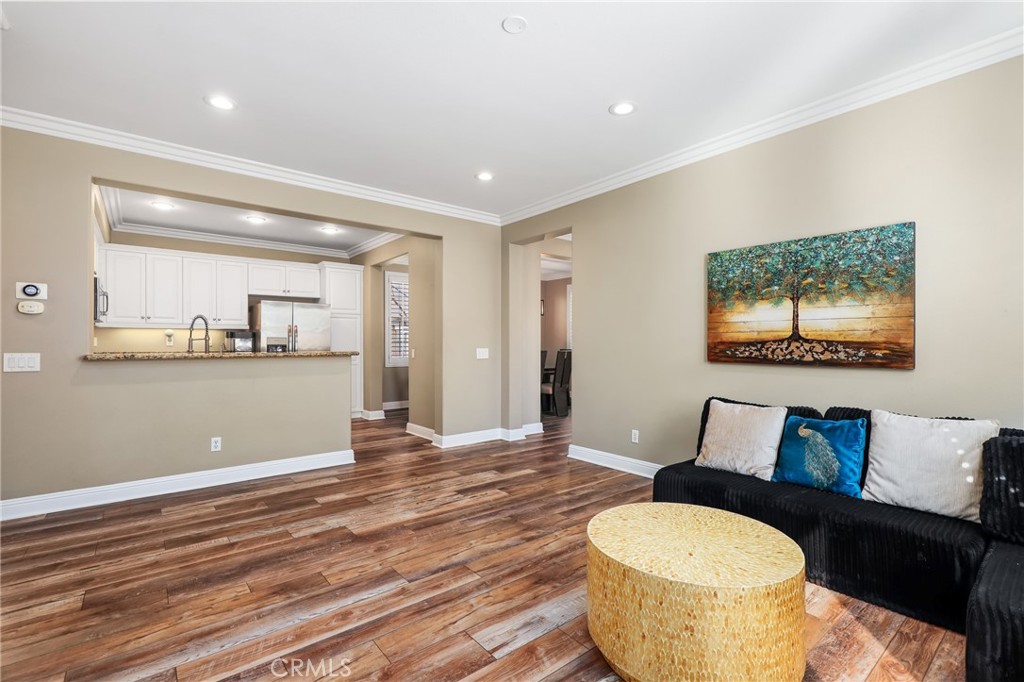 12 Globe Lane Ladera Ranch, CA 92694 - Photo 10 of 37 a living room with a couch and a table