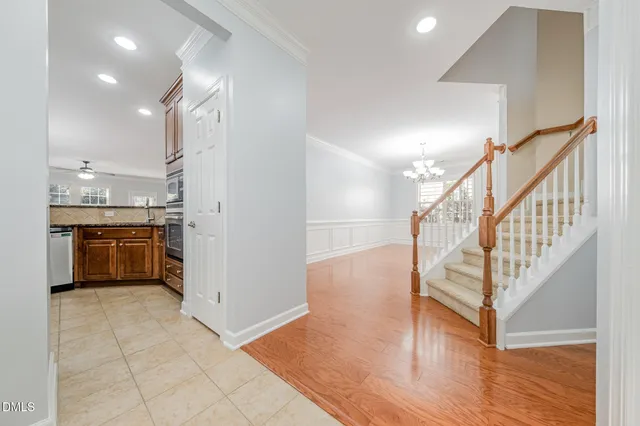 a view of kitchen with furniture and wooden floor