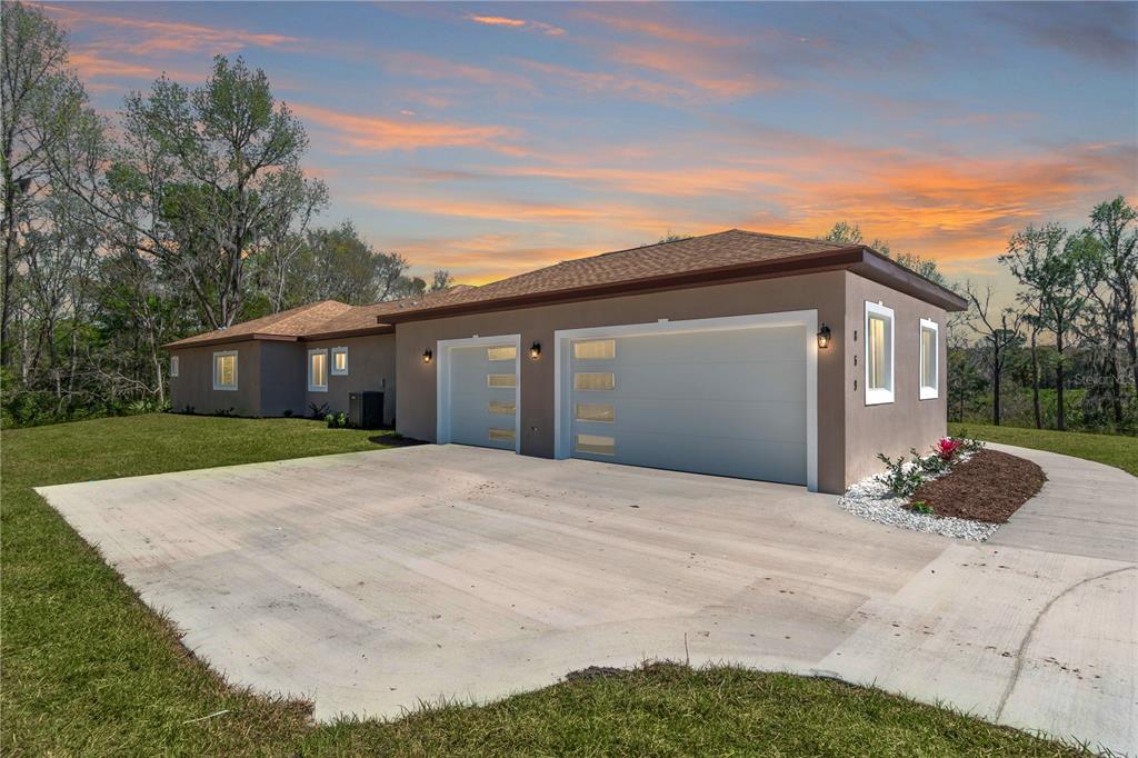 4869 Northwest 101st St Road Ocala, FL 34482 - Photo 44 of 48 lots of parking room for turn around full 3 car garage