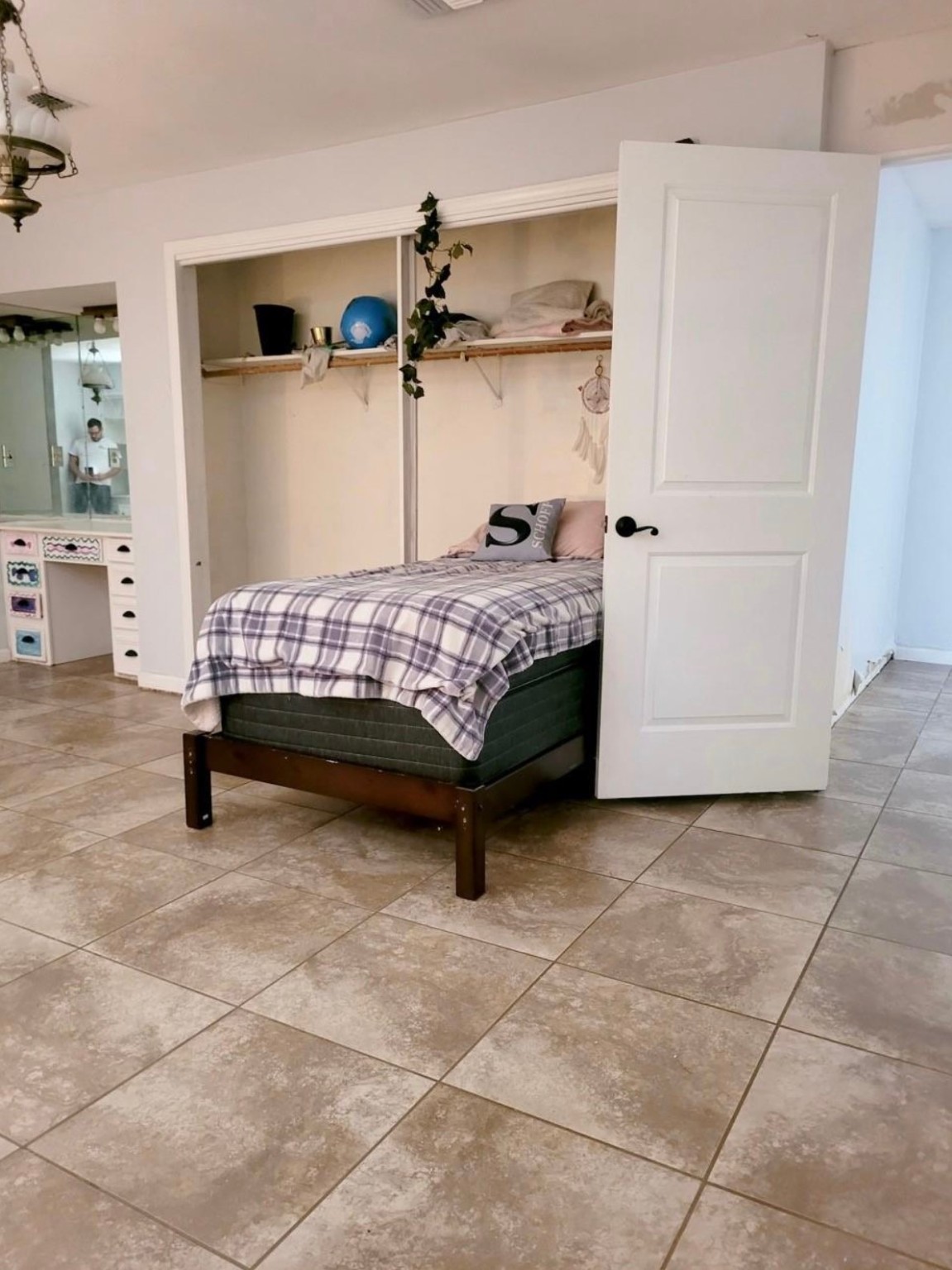 10211 Kerr Lane Conroe, TX 77385 - Photo 17 of 25 a bedroom with a bed and a walk in closet