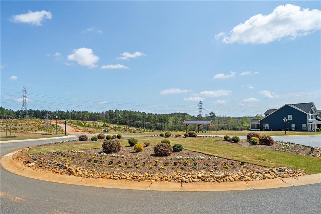 215 Founders Boulevard Central, SC 29630 - Photo 40 of 50 This scenic roundabout offers a glimpse of an inviting community, perfect for relaxed living.