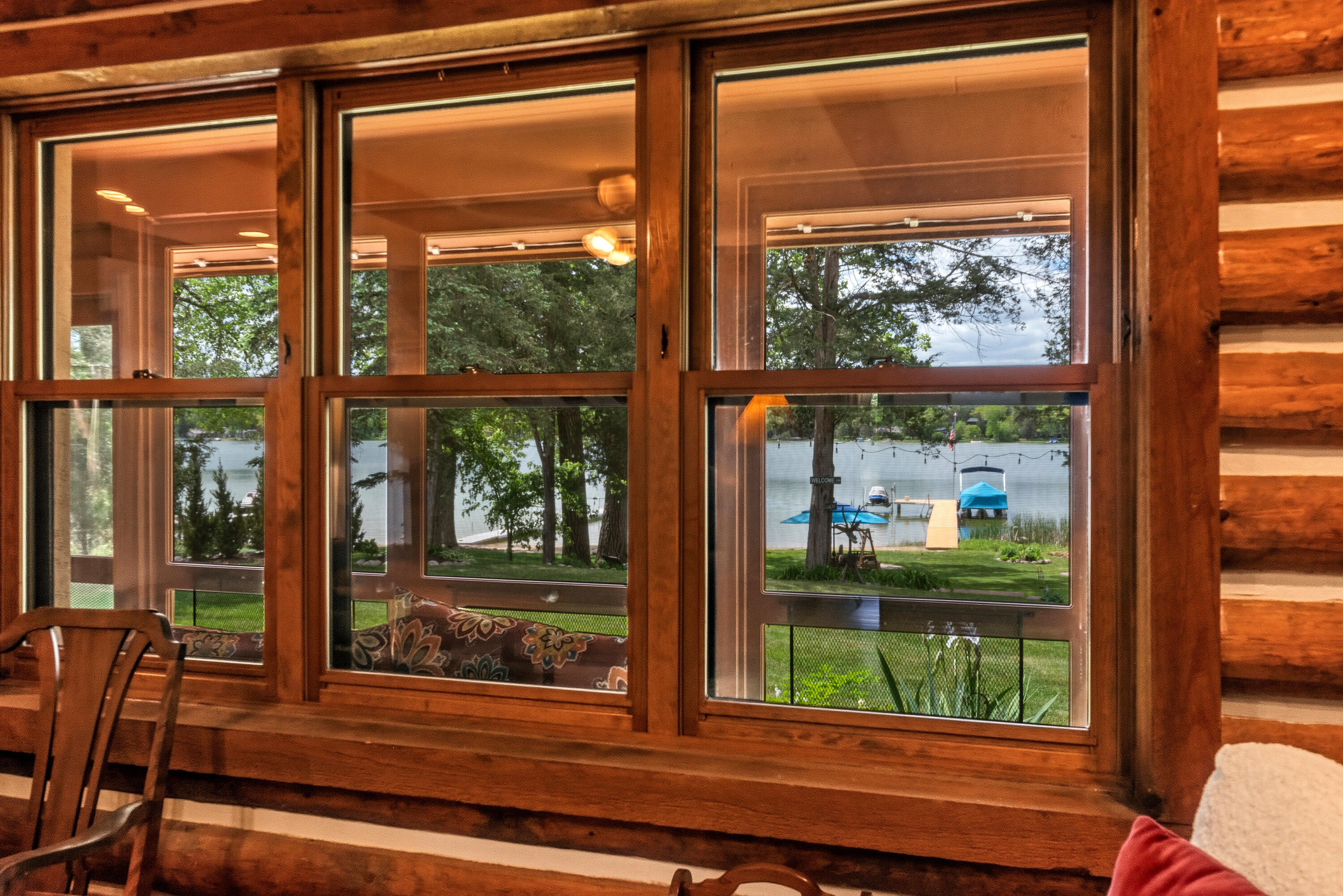 W376S4887 East Pretty Lake Road Ottawa, WI 53118 - Photo 19 of 61 from Great Room into the Porch to the Lake