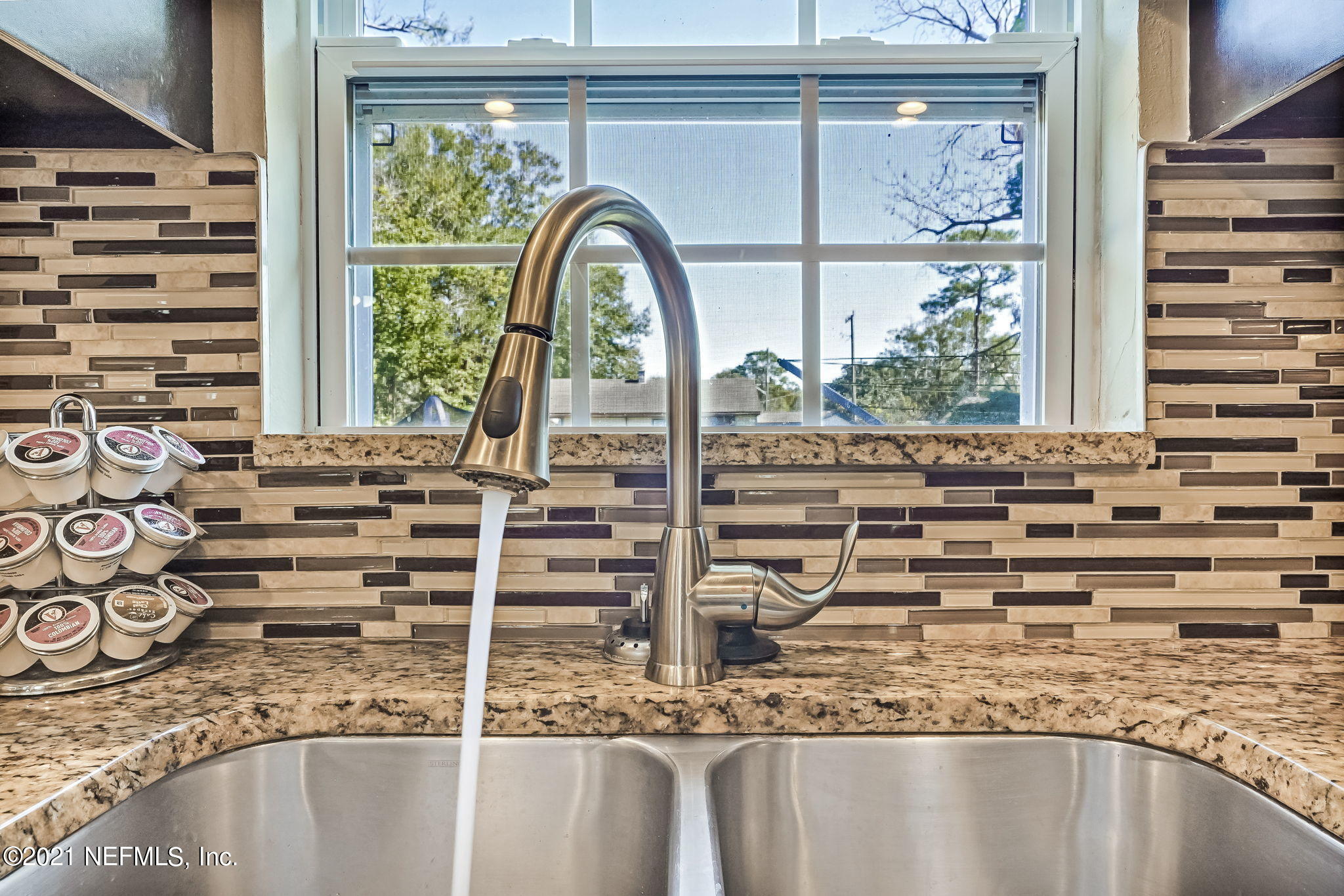 217 Sapelo Road Jacksonville, FL 32216 - Photo 22 of 42 Window View from Kitchen