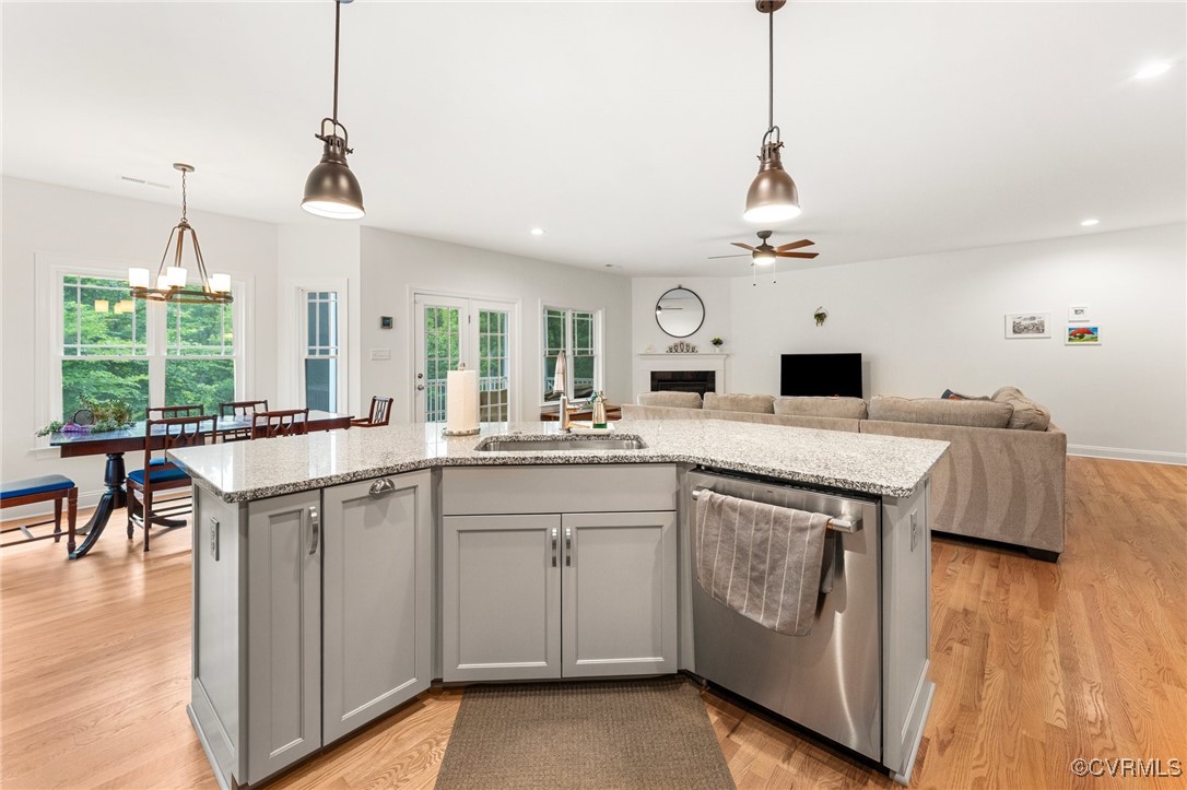 216 Edwin Circle Aylett, VA 23009 - Photo 14 of 27 a kitchen with a sink a stove and a chandelier